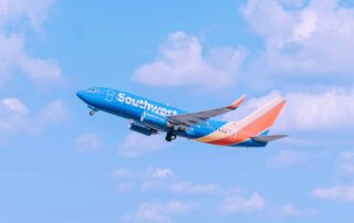 Southwest Airplane Flying in a Blue Sky